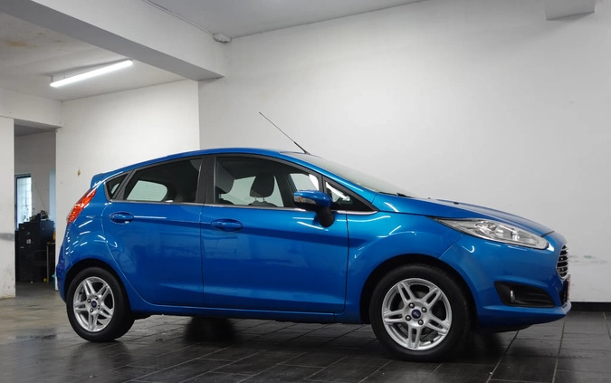 Ford Fiesta cena 26900 przebieg: 166556, rok produkcji 2013 z Wołów małe 781